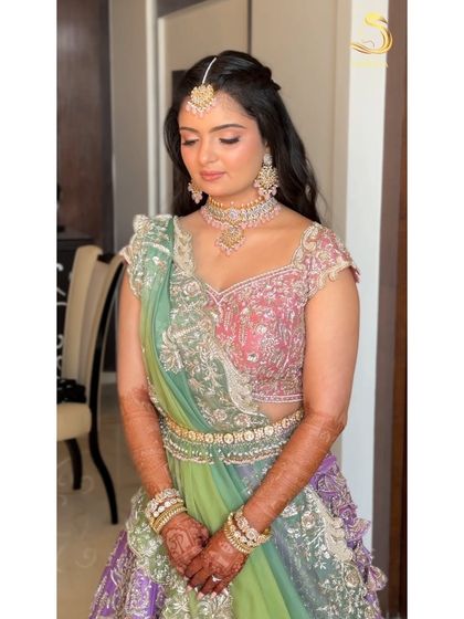 My beautiful bride looking serene and happy with her unique floral braid hairstyle.