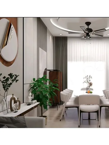 This is the dining section of an open-plan living area. I used a statement mirror and a sleek console table to define the space, while the circular false ceiling design above the dining table adds a sense of intimacy.