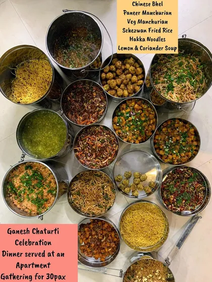 An elaborate Indo-Chinese dinner I catered for a Ganesh Chaturti celebration for 30 people. The menu included Chinese Bhel, Paneer Manchurian, Veg Manchurian, Schezwan Fried Rice, Hakka Noodles, and a warm Lemon & Coriander Soup.