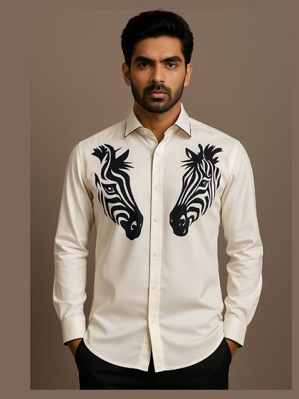 A medium shot of the zebra shirt, showing the model with hands in pockets for a relaxed yet stylish pose. This shirt is versatile enough for various social settings.