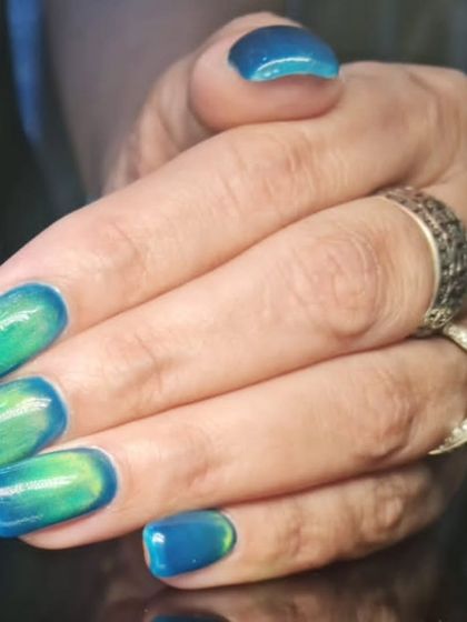 Another angle of the beautiful blue-green shifting polish.