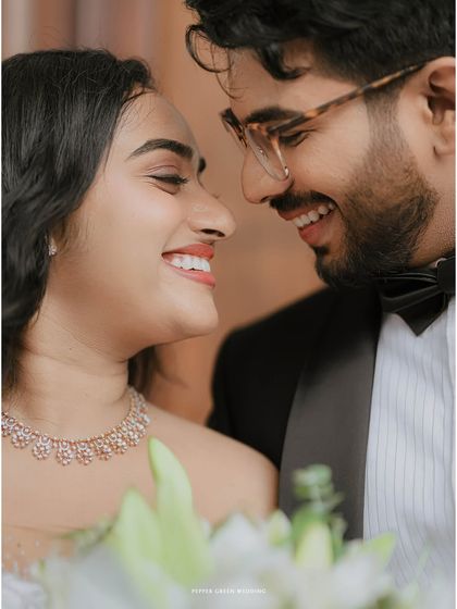 A close-up of pure happiness. The bright smiles and loving gaze between this Christian bride and groom say everything about the joy of their wedding day.