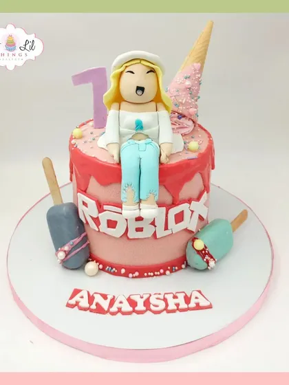 A trendy Roblox-themed cake for Anaysha's 7th birthday, featuring a character avatar and ice cream decorations.