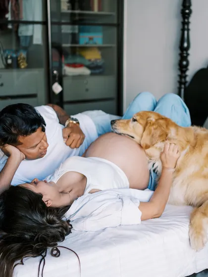 This is what it's all about for me. A relaxed moment at home, the whole family together, including your first baby, the furry one. I focus on capturing these genuine connections that show the love your new baby is coming into.