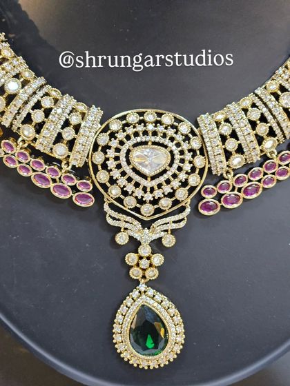 The central pendant of the necklace is a true work of art, with a large heart-shaped diamond.