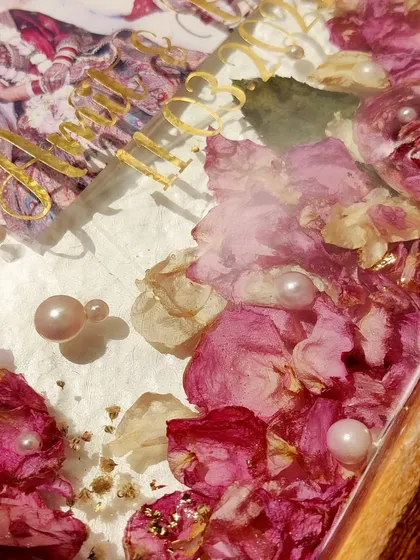 These images and videos showcase various angles and the creation process of my custom wedding and anniversary varmala preservation frames. Each one is made with love to turn your special memories into a timeless treasure.