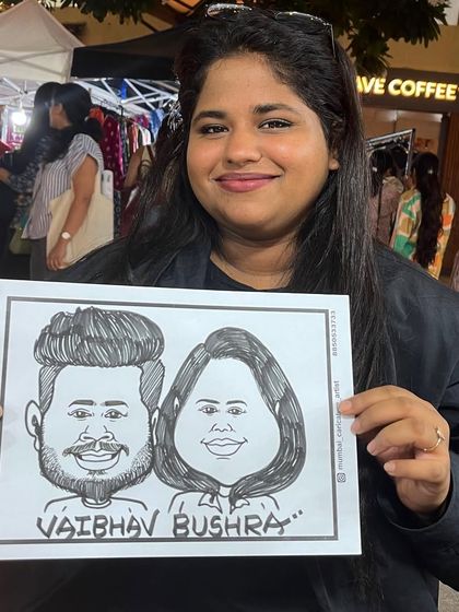 A fun couple portrait from a live event in Mumbai. We aim to capture the unique essence and joy of each pair we draw.