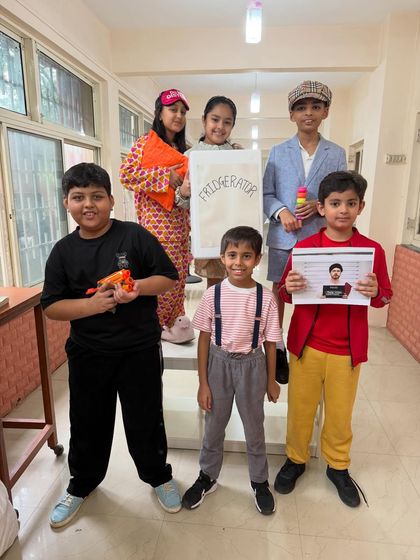 This group showcases a wide array of characters through their costumes and props. This visual variety is a hallmark of our group drama projects, where every student plays a unique and important role.