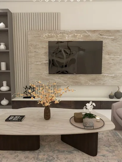 Another view of the TV and seating area. The design is modern, luxurious, and perfect for entertaining.