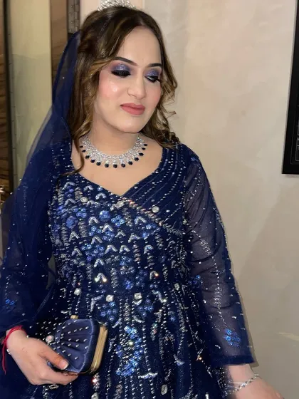 My doll looking absolutely flawless. This is a zero-edit photo showing how the makeup looks in person. A smooth base and striking eyes are key for a glamorous reception or cocktail party.