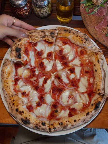 Pizza so good, it just might be your new love language. This is our Goan Sausage pizza, a new addition that's already a favourite.