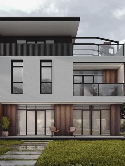 We designed this multi-level residence with a mix of white render, dark cladding, and wood accents to create visual interest. The structure includes multiple balconies and a rooftop terrace, maximizing outdoor living space within a contemporary architectural framework.