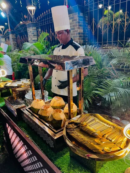 Preparing the Coconut Alaska dessert, a refreshing and tropical treat for guests.
