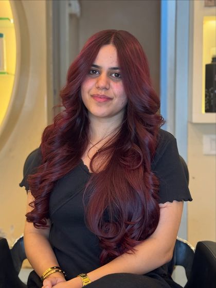 More of our wine-red magic. These shots show off the rich, dimensional color on long, flowing hair, proving that red is always a good idea.