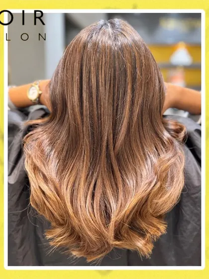 Embrace the festive season with a stunning hair transformation. This beautiful colour work, styled with soft waves, is perfect for shining bright during any celebration.