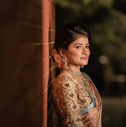 A dreamy engagement portrait. The makeup is soft and romantic, with a focus on the bride's beautiful eyes.