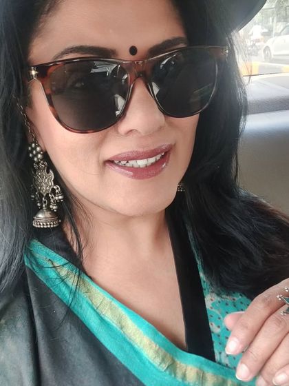 A car selfie showing off my silver jhumkas and ring. Even on the go, the right accessories can elevate a simple cotton silk saree and make you feel put-together.