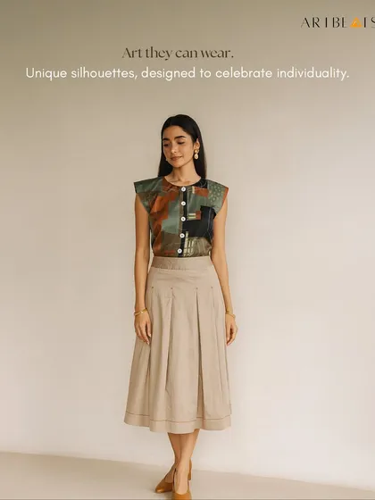 My art is created to be lived in, not just looked at. This top features a print from one of my original paintings, turning a simple silhouette into a piece of wearable art. It's a unique way to celebrate individuality in corporate apparel or personal gifting.