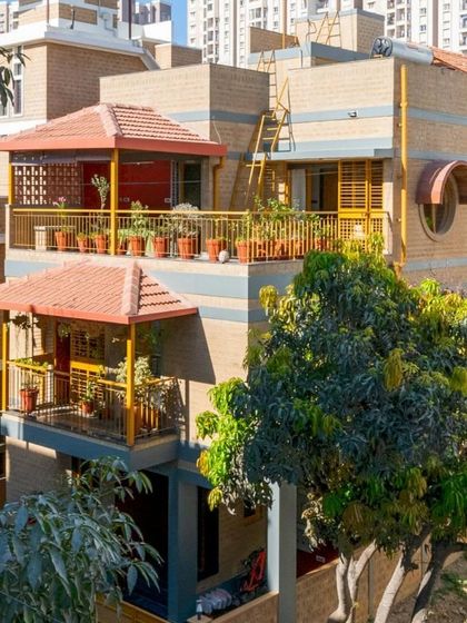 An elevated view of the house, showing how the different levels and rooflines interact.