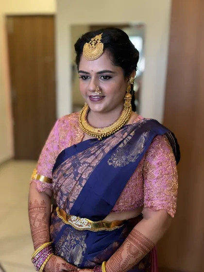Gowthami's happy smile shows how confident and beautiful she feels.