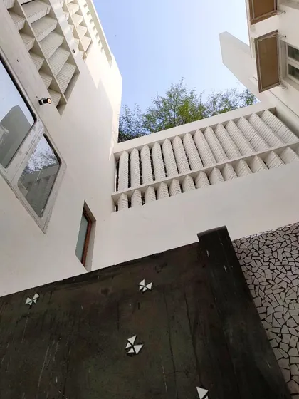 This is a view looking up from within one of our courtyard designs. You can see how the architecture is designed to embrace the open sky, pulling light down into the living spaces. These central courtyards are fundamental to creating homes that breathe and feel connected to nature.