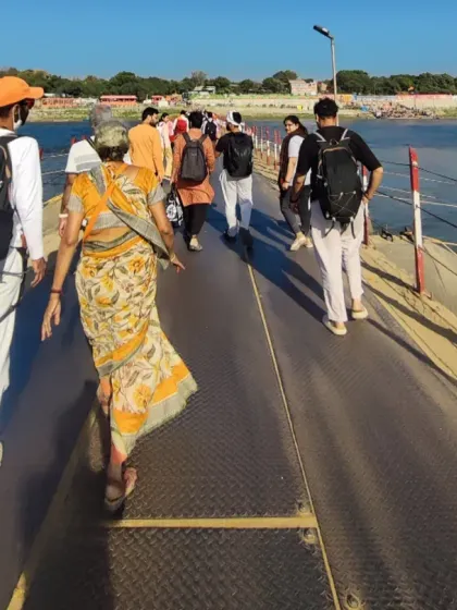 Walking with fellow seekers towards the Sangam during the Kumbh Mela. We move as one body, a river of humanity flowing towards the confluence of sacred waters.