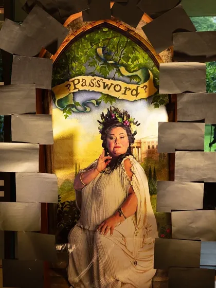 Another view of the Fat Lady portrait entrance, a clever and interactive way to welcome guests into the party area.
