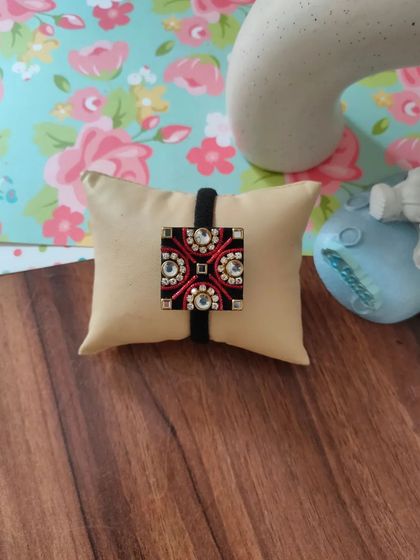 My collection of decorative elastic hair bands. Each one features a unique handmade centerpiece, including gotapatti, Kundan work, zardozi, and bead embroidery.