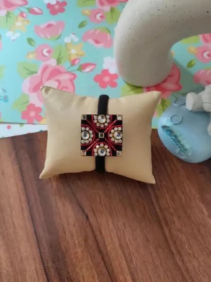 My collection of decorative elastic hair bands. Each one features a unique handmade centerpiece, including gotapatti, Kundan work, zardozi, and bead embroidery.