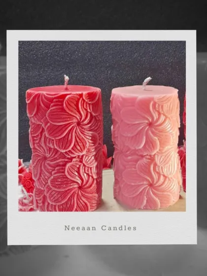 Bloom in wax, burn with love. Our floral pillar candles aren’t just scents, they’re a whole mood. This pair shows our red and pink carved designs.