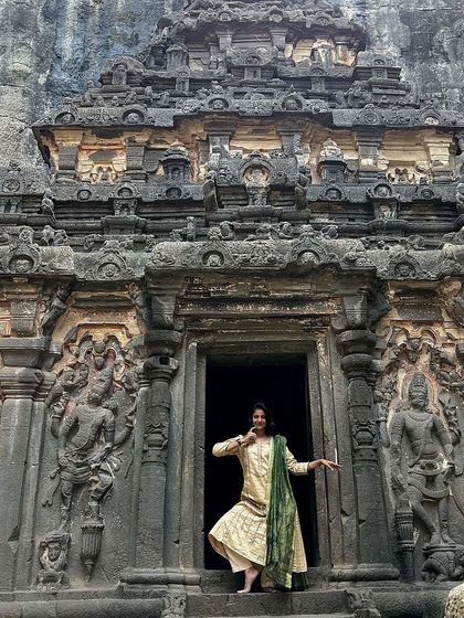 A dance pose at the entrance to the Ellora Caves, a UNESCO World Heritage site. I feel an irresistible urge to dance wherever I find such profound history and beauty.
