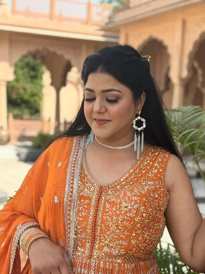 A close-up of the party makeup, highlighting the beautifully blended eyeshadow and the radiant, flawless skin finish.