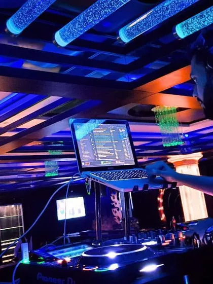 Music upgraded with a class. A shot from a set where the club's lighting and atmosphere perfectly matched the progressive house and techno beats I was playing.