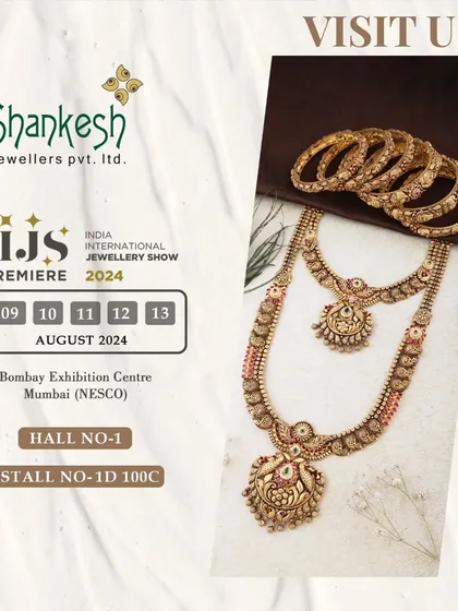 This antique-finish bridal set includes a choker, a matching long necklace, and bangles. The cohesive design and traditional motifs ensure it is a fast-selling item during the wedding season.