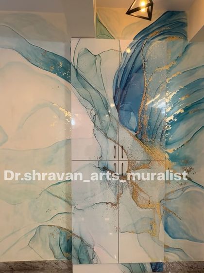 I achieved this alcohol ink effect using standard paints, creating a translucent, layered look. The flowing blues and gold highlights give this vertical wall a sense of movement and depth.