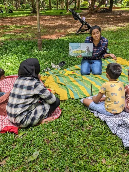 Photos from our 'Environment' week session. You can see the children learning about nature and conservation through engaging stories, right in the heart of nature itself.