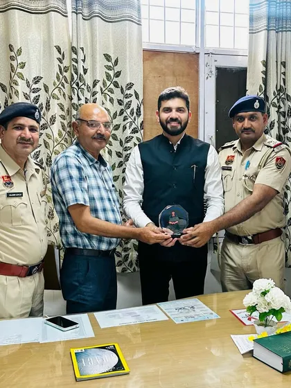 Being felicitated by the Superintendent of Police, Bhondsi, Gurugram, after a training session.