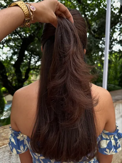 Sometimes all you need is a color refresh and a good haircut. I touched up her roots, toned her existing highlights, and gave her a fresh layered cut to bring her hair back to life.