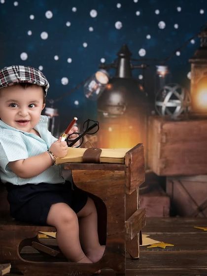 A curious scholar in our vintage library setup. The warm lantern light and classic props create a magical and studious atmosphere.