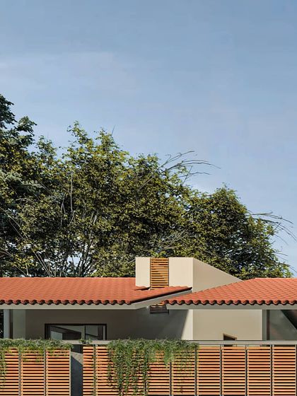 The street elevation render for 'Benchmark Aradhya', showing the use of traditional country tiles on the roof.