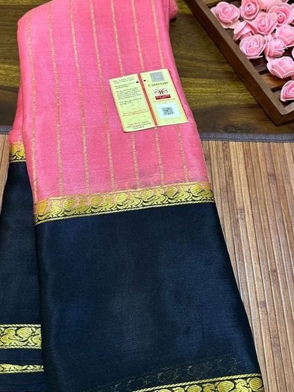 A pink and black wrinkle crepe Mysore silk saree, a classic and elegant combination.