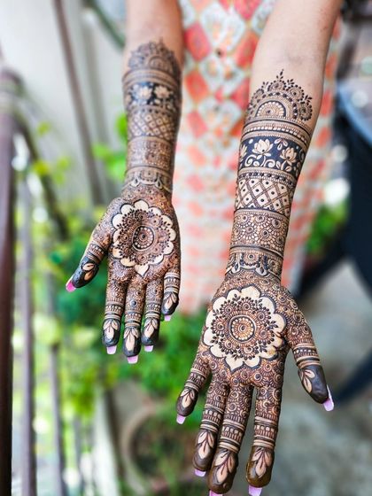 The back of the hands, showing how the patterns complement each other.