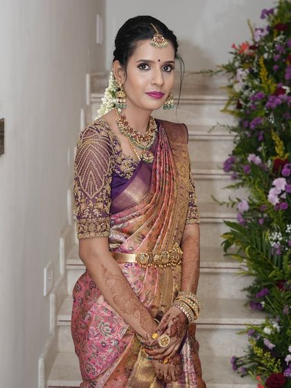 A picture-perfect family celebrating their housewarming. I had the pleasure of dressing my client Archana in a hand-worked blouse, her husband in a custom shirt, and their son in a charming Kalamkari kurta.