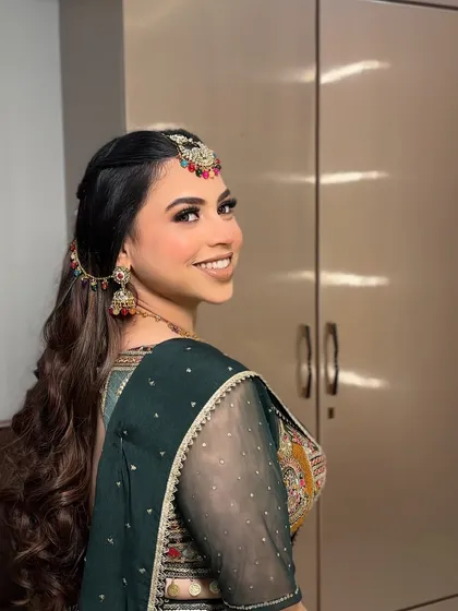 A happy client is the best reward. Her smile shows how confident and beautiful she feels in this look for her pre-wedding celebration.