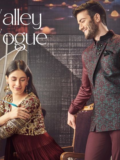 Inspired by the timeless valleys of Kashmir. This look pairs a deep maroon kurta with a teal patterned waistcoat, creating a rich and artistic ensemble.