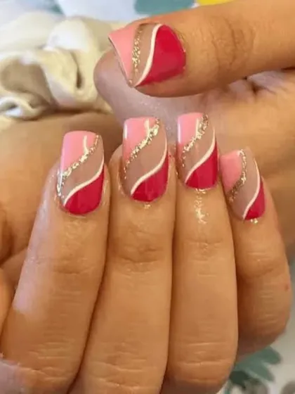 A creative and artistic design using shades of pink and red. I used negative space and wavy lines of gold glitter to create a modern and eye-catching pattern.