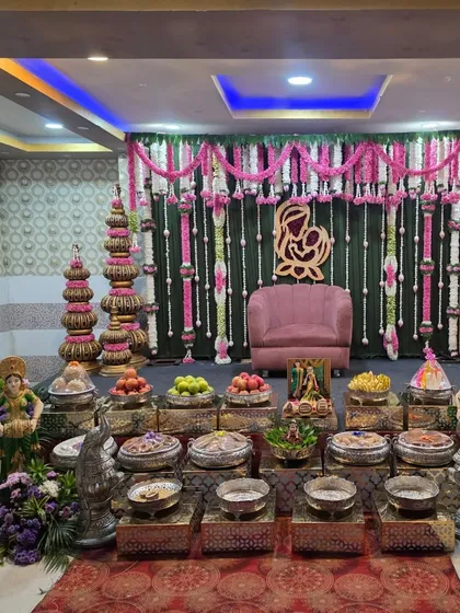 A full frontal view of the baby shower stage, with its symmetrical design and colorful elements.