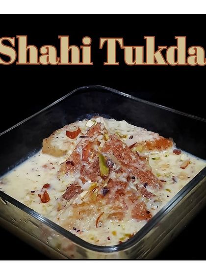 A decadent Shahi Tukda, a royal dessert made with fried bread slices soaked in rich, sweetened milk and garnished with nuts.