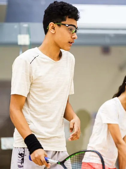 A candid shot of Abdus Samad during a practice session. His focused expression shows the dedication of a young athlete preparing for a major national tournament.