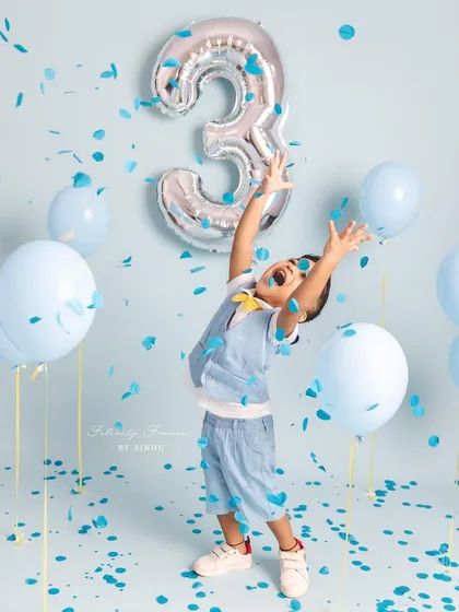 Three cheers for turning three! Milestone birthdays are such a joy to photograph. We celebrate with confetti, balloons, and lots of laughter to capture the vibrant energy of your growing child.